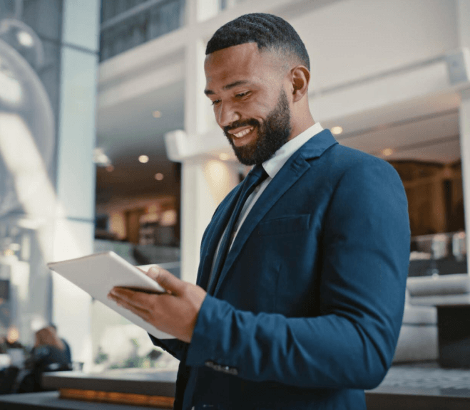 black-american-man staring-at something-on-his notepad