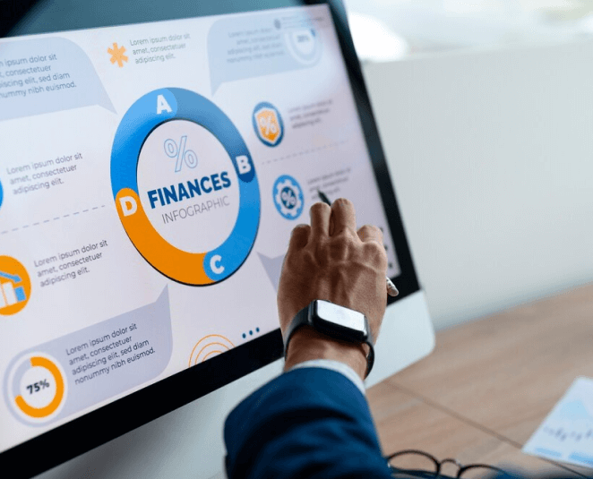 a black skinned hand pointing out financial infographics